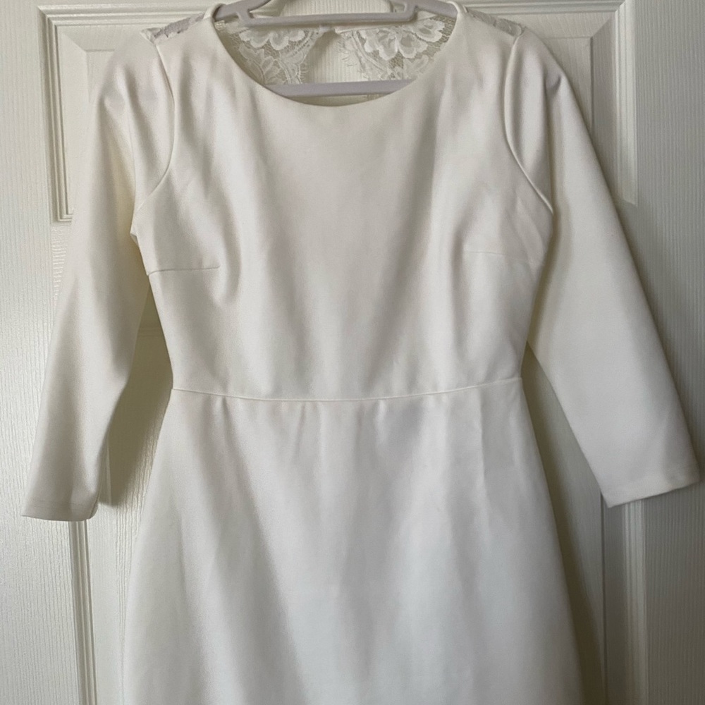 White bridal dress with lace back detail